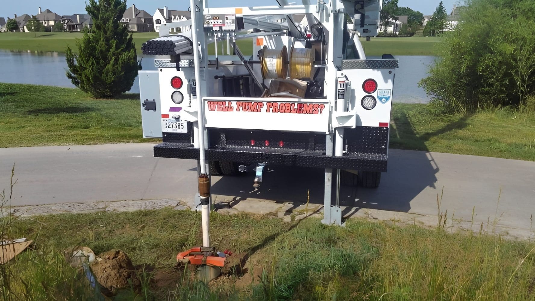 Worksite with truck and dug hole