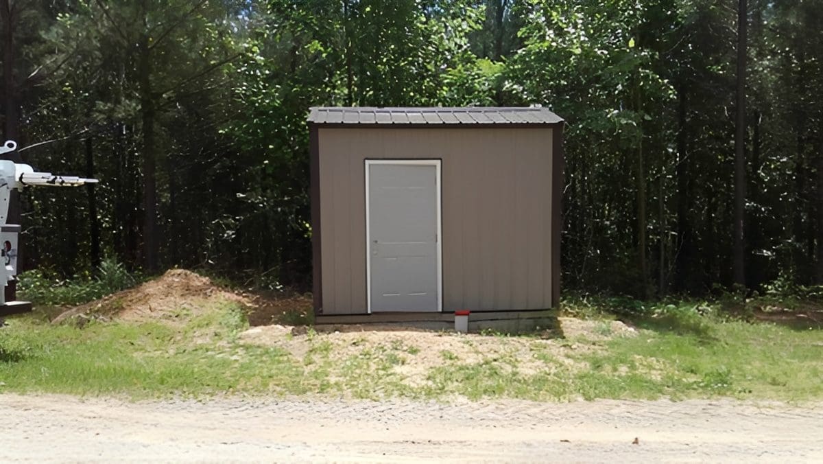 Outdoor shed surrounded by trees