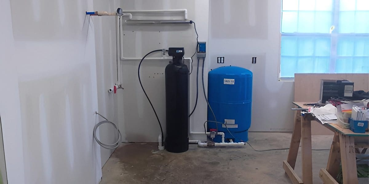Installed water system and equipment in garage